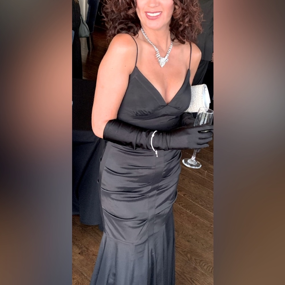 Black satin classic evening gown.